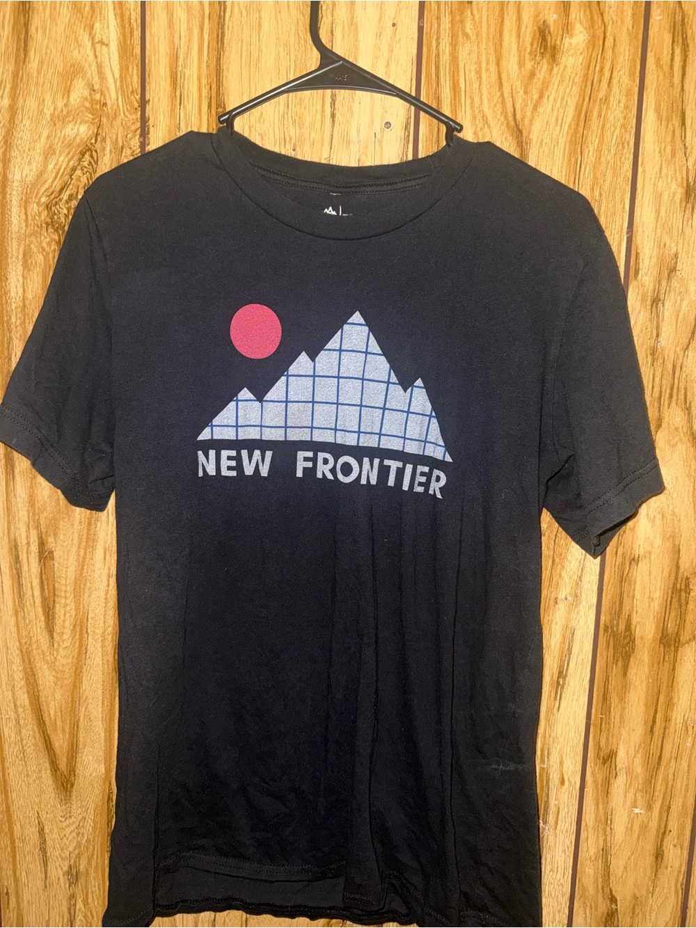 New Frontier Black Tee with Blue Grid Mountain and Pink Sun